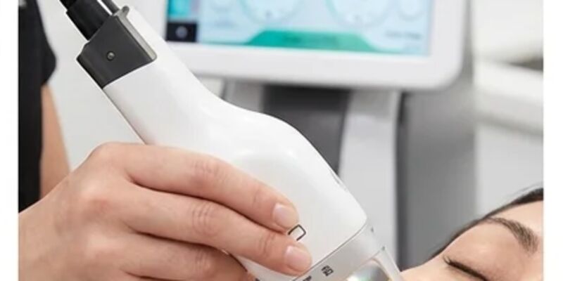 LaseMD Ultra handpiece treating patient skin